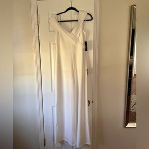 White Lulu’s jumpsuit, perfect for spring + summer brides